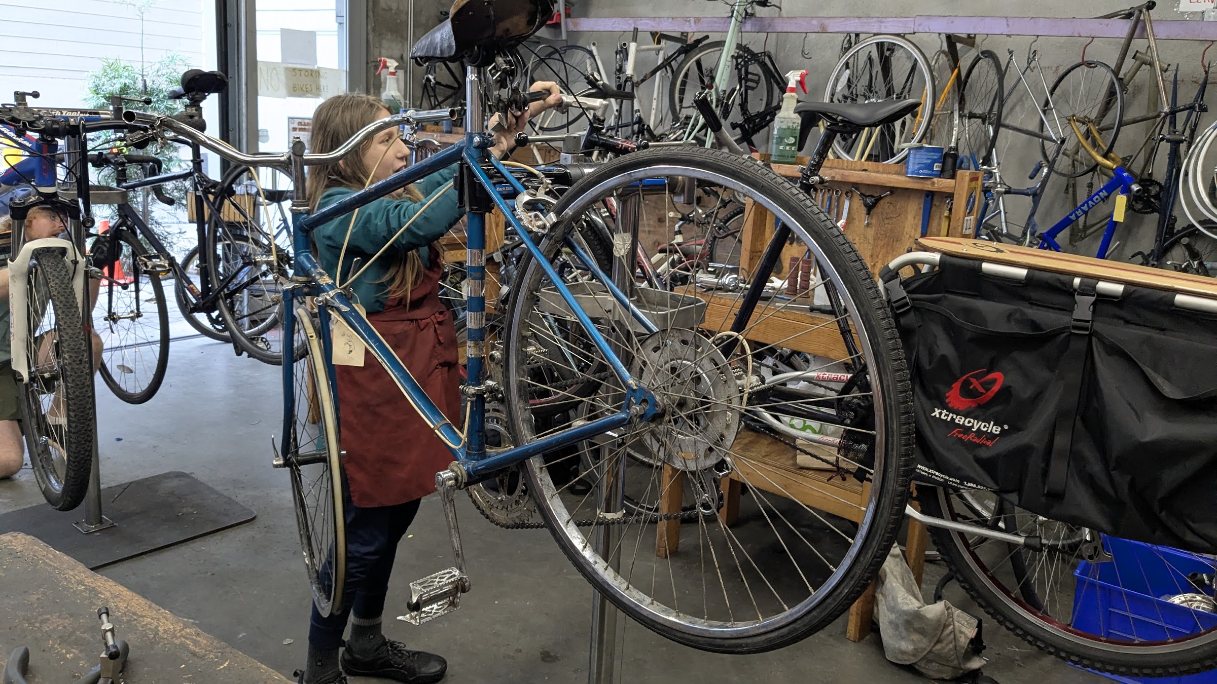 Participant working on a bike